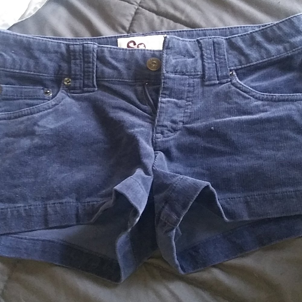 Navy blue shorts not sure of the brand.